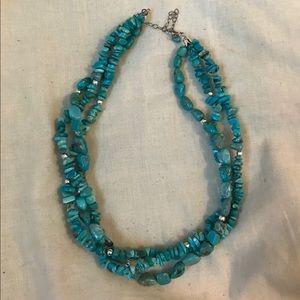 Three strand turquoise necklace.